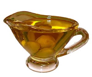 Small jug with olive oil.