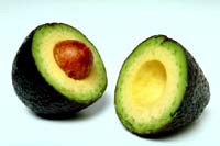 Avocados are good for lowering cholesterol: Picture of an avocado cut in half.