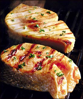 Two grilled salmon steaks rich in omega 3. Filled with good cholesterol.